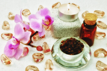 Spa concept. Flowers, candles, sand.