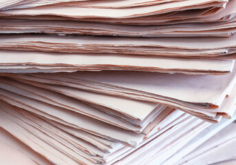 Close up of a newspaper pages, paper, stack of newspapers.