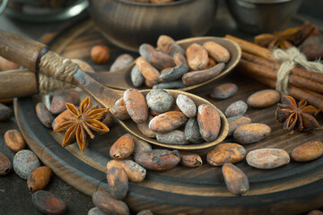 Cocoa beans on old background