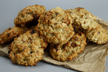 Homemade oatmeal cookies with raisins on craft paper