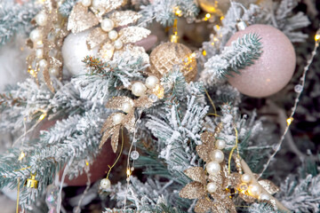 festive christmas tree with decorations and toys
