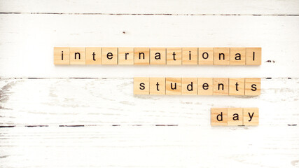 International Students' Day.words from wooden cubes with letters photo