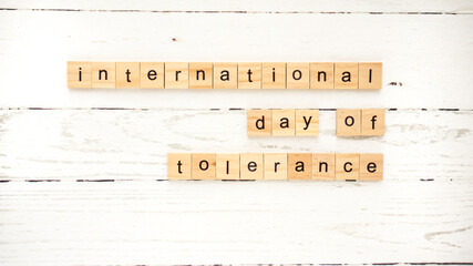 International Day for Tolerance.words from wooden cubes with letters photo