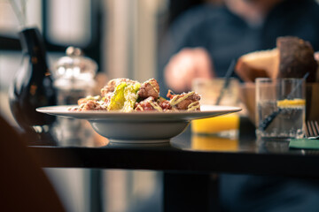 salad served in restaurant with a nice atmosphere