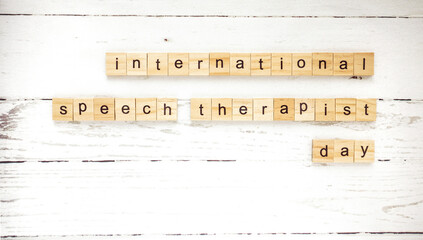 International day of speech therapy.words from wooden cubes with letters photo