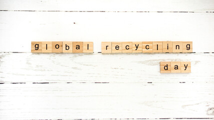 Global Recycling Day.words from wooden cubes with letters photo