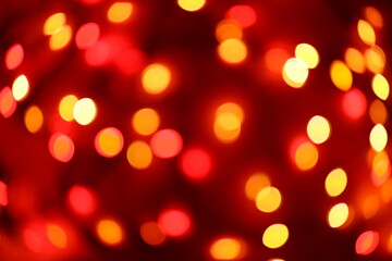defocused lights abstract red and yellow christmas background bokeh