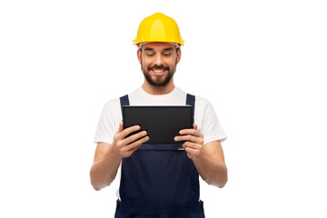 profession, construction and building - happy smiling male worker or builder in yellow helmet and...