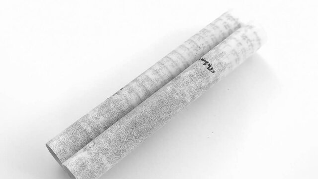 Footage of rotating Mezuzah scroll called a Klaf inscribed with Hebrew verses from the Torah. These verses consist of the Jewish prayer Shema Yisrael.