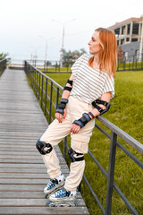 Standing full-length portrait of roller-skater. Summer activities