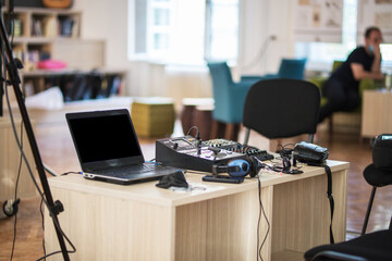 Technical equipment for live streaming on little table in event room