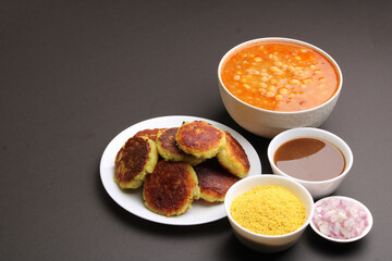 Ragda pattice -Aloo tikki or Potato Cutlet or Patties is a popular Indian street food made with boiled potatoes, spices and herbs served with tamrind chutney and peas curry.
