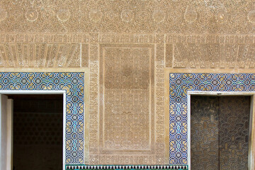 two doors of the alhambra with decorated wall