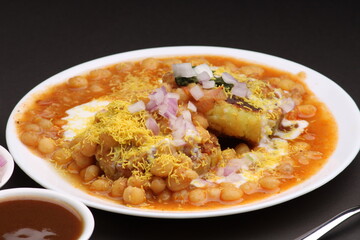 Ragda pattice -Aloo tikki or Potato Cutlet or Patties is a popular Indian street food made with boiled potatoes, spices and herbs served with tamrind chutney and peas curry.