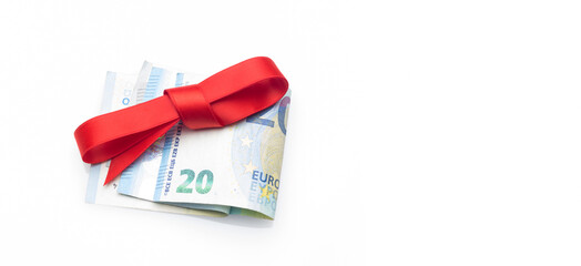 Money decorated with pretty colored bows