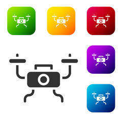 Black Drone flying icon isolated on white background. Quadrocopter with video and photo camera symbol. Set icons in color square buttons. Vector.