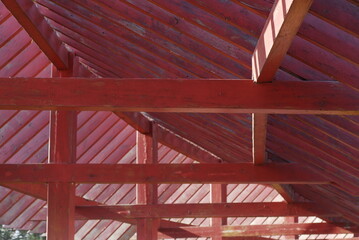 Naklejka premium Red wood artistic roof beam in China
