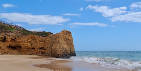 Red cliffs at a beautiful Algarve beach in Portugal