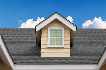 fake window on garret house and roof shingle wirh blue sky background. Asphalt Shingles or Bitumen...