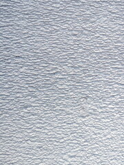 rough plaster wall surface in white