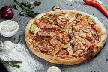 Sliced Pepperoni Pizza with salami, sausages and yogurt