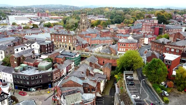 Aerial Overhead Drone Shot Flying over UK City Centre towards Church (2.7K)
