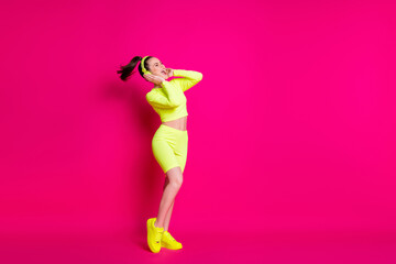 Fototapeta na wymiar Full length body size view of her she attractive thin slender cheerful glad girl listening pop rock music having fun entertainment isolated bright vivid shine vibrant pink fuchsia color background