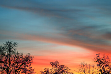 Fototapeta na wymiar evening sunset with vivid clouds