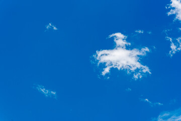 Obraz na płótnie Canvas african stock photo of white clouds in a crisp blue sky