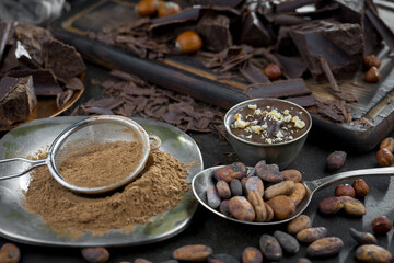 Cocoa beans on old background