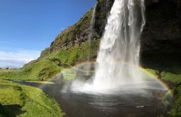 Fototapeta premium Waterfall with double rainbow