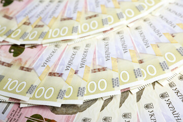 Closeup view of Ukrainian money as background. National currency