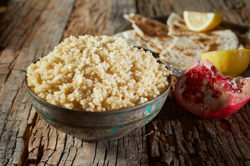 Bowl of healthy organic couscous and quinoa