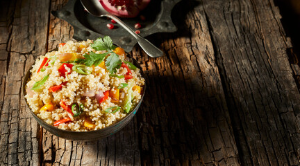 Healthy bowl of quinoa and couscous salad