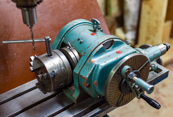 The dividing head of the drilling machine closeup