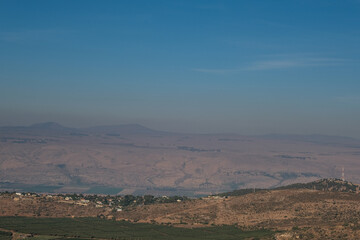 Naftali mountains range with keren naftali mountain, Hula valley, Golan Heights and Mount Hermon as seen from Kibbutz Malkia lookout point, located on iraeli-lebanese border in Upper Galilee, Israel.