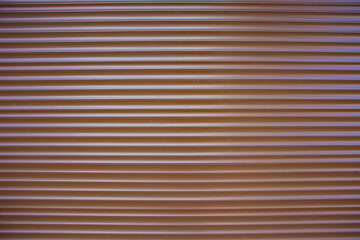 Obraz premium Texture of corrugated wall made of brown metal.