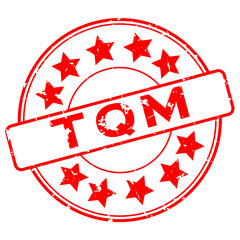 Grunge red TQM (Abbreviation of total quality management) word with star icon round rubber seal stamp on white background