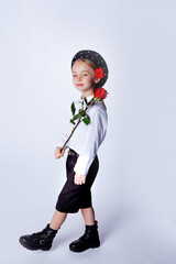 Fototapeta premium cute five year old girl in a black beret and formal clothes