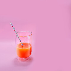 Fruit pumpkin apple carrot ginger on colored background hands juice tasty