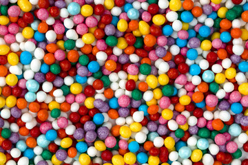 Fototapeta na wymiar colored pastry balls close up macro