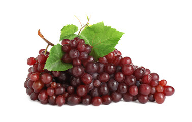 Bunch of fresh ripe juicy red grapes with leaves isolated on white