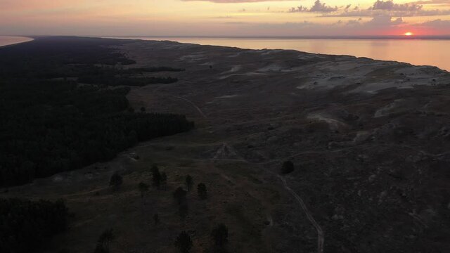 Drone aerial view of Dead Dunes in Neringa, Lithuania. UNESCO World Heritage Site