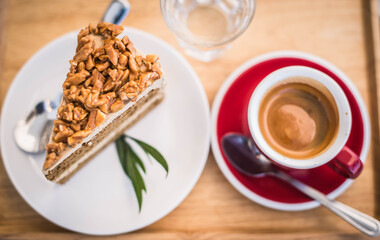 Espresso coffee and cake, ready to serve to customers.