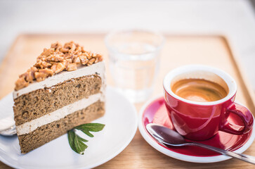 Espresso coffee and cake, ready to serve to customers.