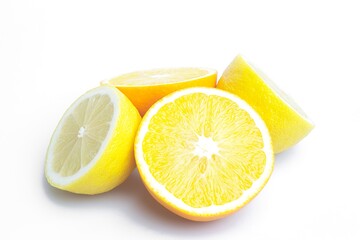 Fresh cut orange and lemon on the white background 