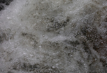 water bubbles in a running stream
