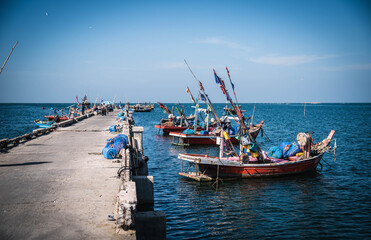 Local fishing boats dock at Saphan Pla Pier, Hat Won, Bang Saen District, Chonburi Province