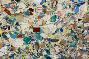 Fototapeta premium Colorful mosaic wall. Ceramic decoration. Abstract pattern. 
