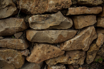 Wall made of stones. Rocks texture. 